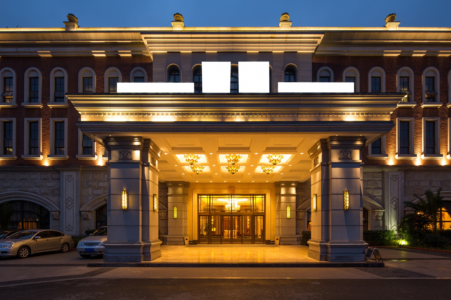 Luxury resort entrance with colored asphalt